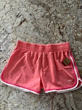 Reebok Pink Women’s Athletic Shorts with White Trim
